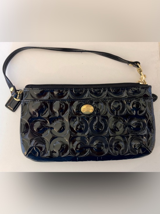 Coach Handbags - Never used Coach Peyton Op Art Embossed Black Patent Leather Wristlet Clutch
